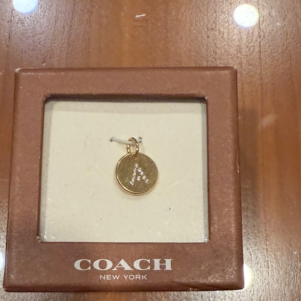 Coach Gold-Tone Round Pendant